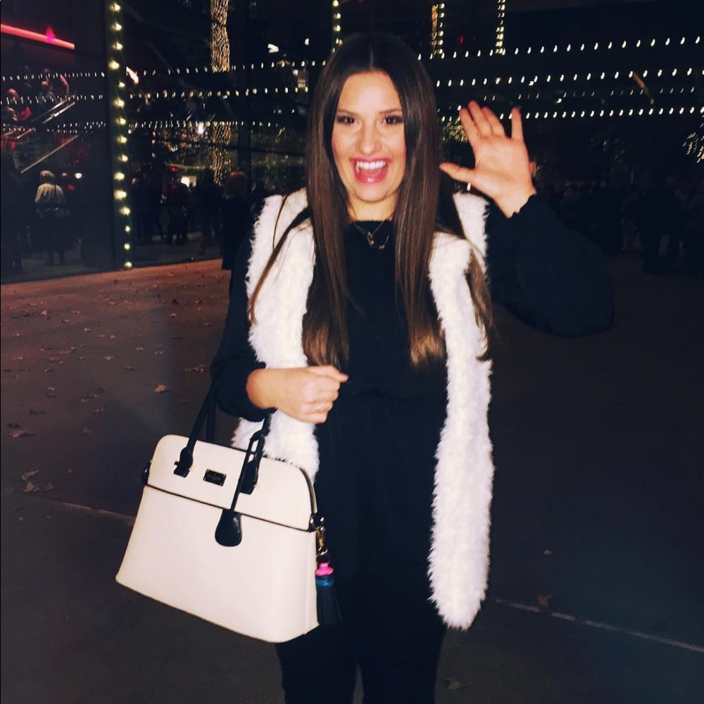 White faux fur vest